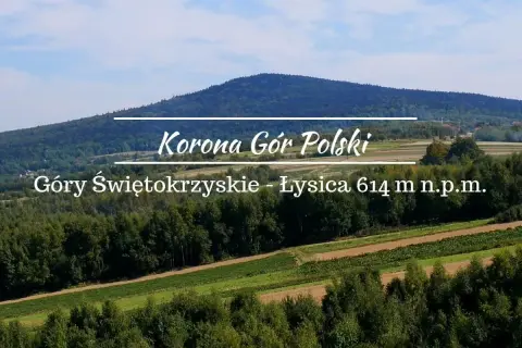 Łysica, najwyższy szczyt Gór Świętokrzyskich, wznosi się majestatycznie nad zielonymi wzgórzami.