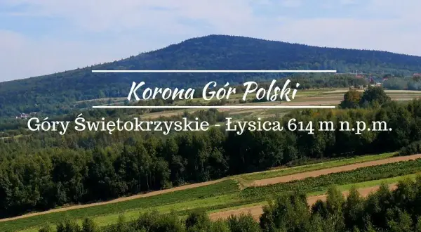 Łysica, najwyższy szczyt Gór Świętokrzyskich, wznosi się majestatycznie nad zielonymi wzgórzami.