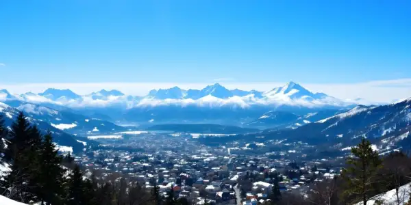 Zimowy krajobraz Zakopanego z ośnieżonymi szczytami Tatr w tle. Idealne miejsce na plan "Zakopane w 3 dni co zwiedzić".